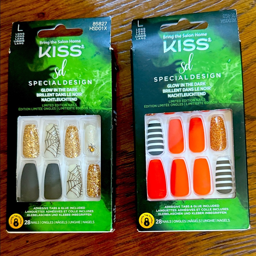 KISS-Two special design glow in the dark adhesive tab/glue Halloween nail packs.